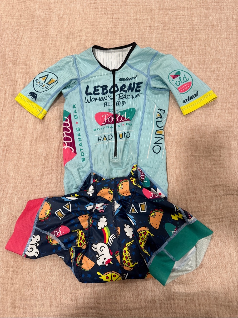 Eliel Light Blue and Navy Leborne Women’s Cycling race cut skinsuit.
